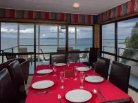 By the Bay Beachfront Apartments Hotels in Taipa