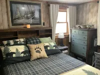 Cozy countryside cottage located on Crooked river in Naples Maine.