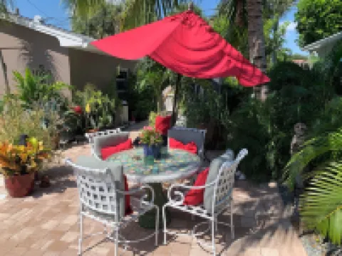 Chill on the Patio Overlooking the Pool & Lush Gardens with Privacy!