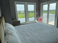 Two Seas- Waterfront Beach House New in 2023 - Oak Island, NC