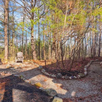 Quaint cabin nestled in the pines.