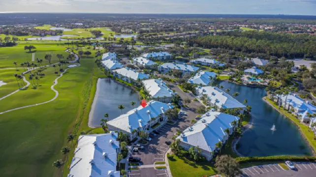 Rare NEW 2/2 Condo in Naples with Lake & Golf View! Home Away from Home