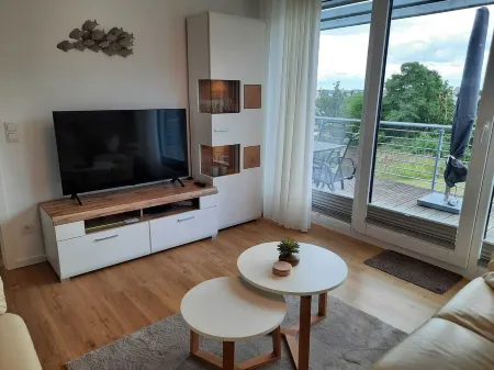 Modern top floor apartment with a view of the sea and Stralsund