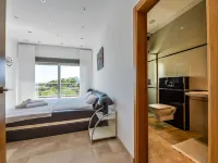 Large modern villa with indoor and outdoor pool sauna and bar.