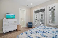 Walk or Bike to Everything! Private Beach Access! Resort Style Pool and Cafe!