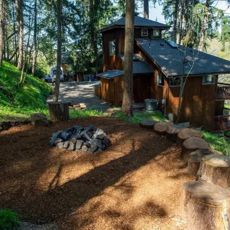 Tranquil Forested Cabin with Sauna, Home Gym, & AC