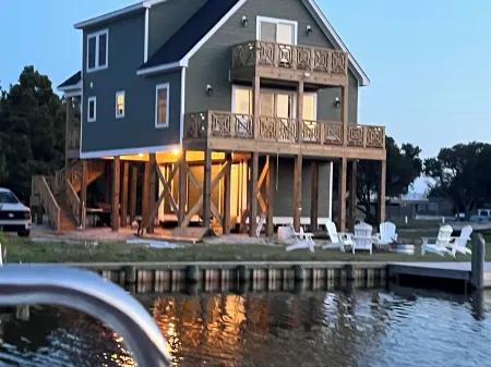 New in 2024 Carova Beach Canal Front Home!! 4X4 Required