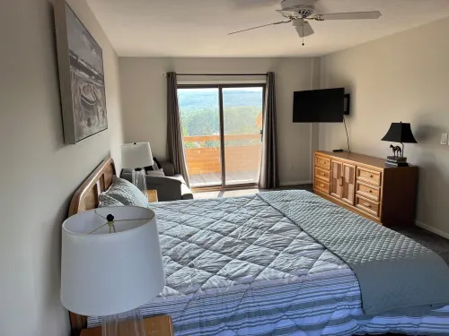 Fantastic view of The Highlands! Comfortable 2-bedroom w/loft condo. Come relax.