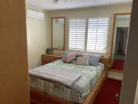 Experience Helper Charm - Spacious 4-Bedroom Retreat