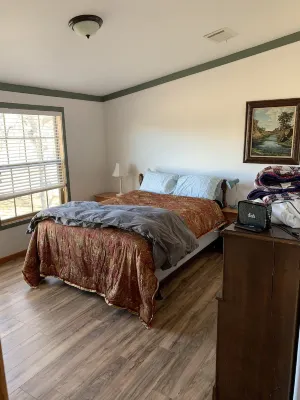 3/2 large home in Kerrville on Town Creek frontage! Great 30 ft front porch.