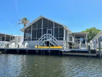Waterfront retreat with boat dock & private ramp right off the river