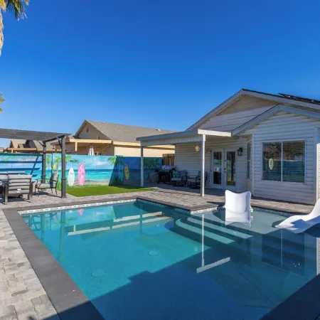 Seaside Cottage in walking distance of downtown Gilbert with charming pool.