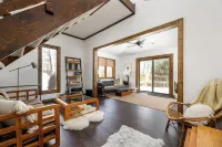 Centrally located cozy cottage tucked into the woods, a perfect family retreat