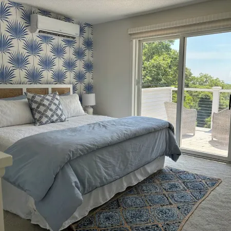 Modern coastal retreat w/ pool, close to beaches and golf courses.
