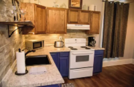 Upscale King Suite with Purple Mattress and reserved off-street parking