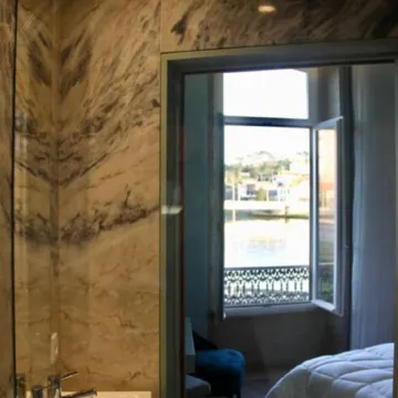 A Rendilheira Charm Suites