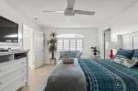 Spacious Deck with Peek-a-Boo Water Views - Exquisite Coastal Haven