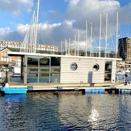 Houseboat Luv in Sonwik harbor with a view of Denmark