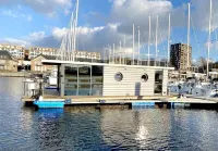 Houseboat Luv in Sonwik harbor with a view of Denmark