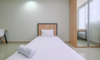 Minimalist Studio Room at Evenciio Margonda Apartment