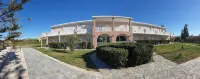 Odos Oneiron Tavronitis Bay Hotels in der Nähe von Afrata Beach