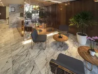FlowSuites WTC Hotels near Poliforum Siqueiros