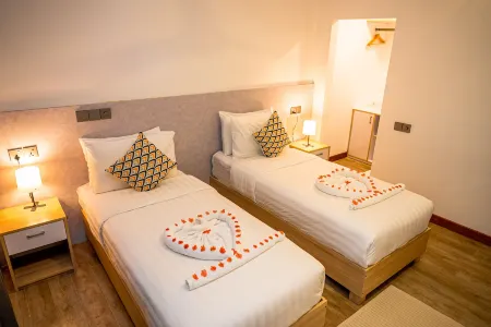 Holiday Crib Отели рядом с достопримечательностью «Meeru Island Resort and Spa»