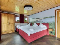 บ้านพักตากอากาศในฟรีสลันด์ ใกล้คลองและทะเลสาบ โรงแรมใน