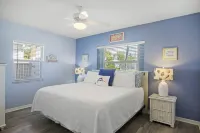 4-Bed Coastal Retreat: Heated Pool, 200 Steps to Beach, Walk to Fun!