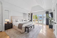 Stunning Waterfront Mansion w Pool n Hottub