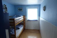 Vacation home Störtebecker in a cozy semi-detached house on the outskirts of the village
