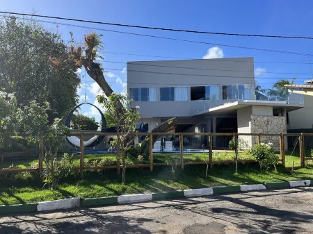 Casa Paraíso - 06 suites - Guarajuba - 200 meters from the beach Отели рядом с достопримечательностью «Jenipabu»