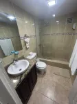 Air-conditioned 1 bed 1 full bath 1 half bath apartment.  Hot Water & generator.