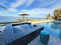 Riverfront 5 bedrooms, 5 baths , pool , spa , beach , dock and stunning views !