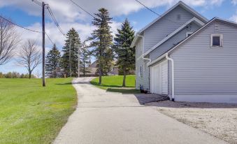 Walk to Beach Home with Game Room and Yard in Algoma!