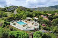 Tropical Condo with Spectacular Ocean Views, Panoramic Dining Terrace & Quick Walk to Beach - Pools