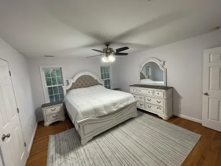 Luxury 5-bedroom house in Cedar Point with AC, WiFi, hotub, private yard & more!