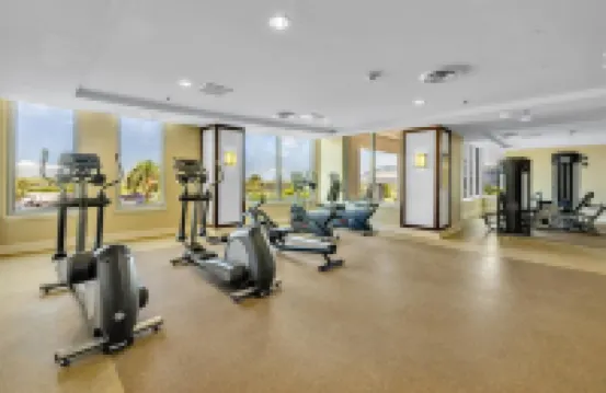 Beachfront! Coastal Designer Glam with Resort Amenities. Private Balcony & Grill