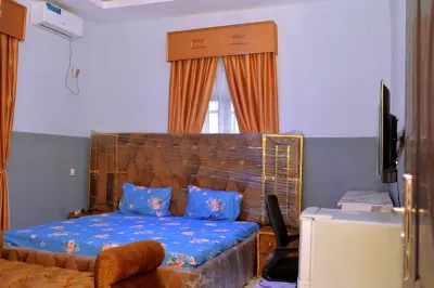 Cozy 2-Bedroom Luxury Apartment With AC, WiFi, Solar, BoreHole Water, CCTV Nnewi Отели в г. 