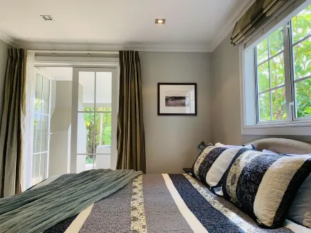 Tinkerbell Cottage - Russell Cottages Collection Отели рядом с достопримечательностью «The Strand Beach»