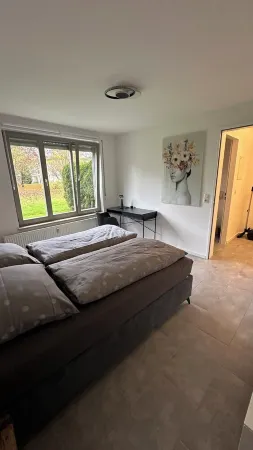 Cozy vacation apartment with garden in Schönefeld near Berlin
