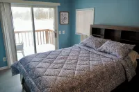 Escape to a cozy cottage on Ausable Lake, in Lupton, Michigan!