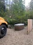 Bee Haven Bus at the RMR Farmstead with hot tub