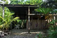 Beautiful cabin in the beachfront, perfect to explore jungle and sea. Full relax Hotels in 