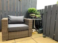 Spacious & homely ground floor apartment in central village location near beach