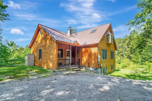 18+ acres! Sun drenched 5 bedroom. 12 min from Okemo! VAST trails 5 min away!