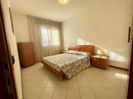 Modern poolside stay with balcony