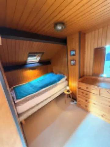 Apartment with beautiful view over a wooded park and a large terrace