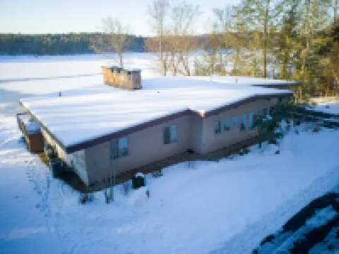 Lakefront Retreat with Hot Tub and Dock Access - Stunning Modern Oasis
