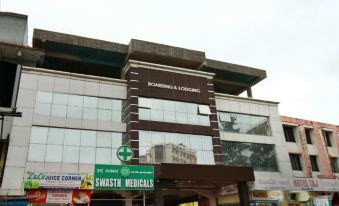 Treebo Comforts Inn, University Road Deralakatte